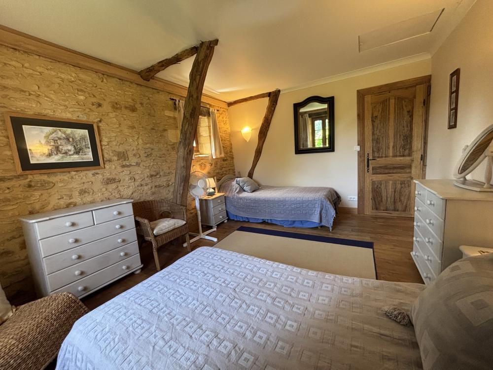 La chambre attenante avec 2 lits simples 