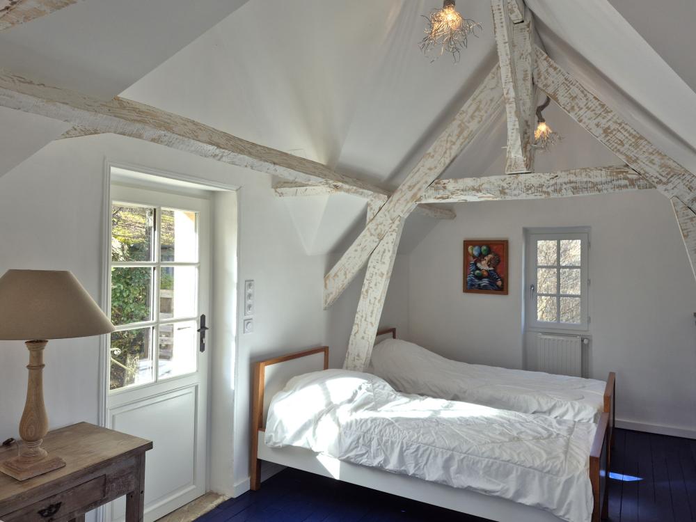 troisième chambre avec deux lits simples