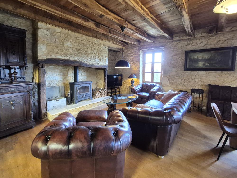 avec canapé et fauteuils en cuir