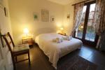the second double bedroom at groundfloor with french doors leading to the terace 