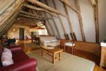 the cosy lounge at first floor with exposed beam structure