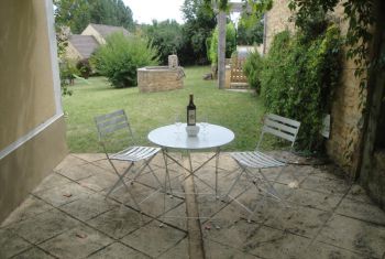 La terrasse couverte de vigne