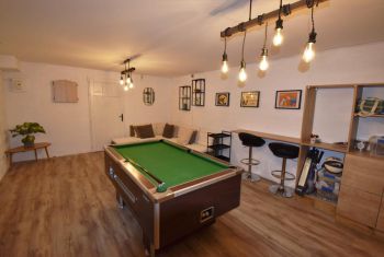 The billiard table and games room on the ground floor