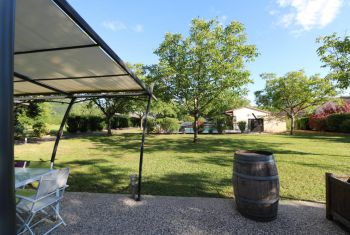 Beynac tabacco barn - the view over the pool and garden 