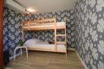 la chambre enfant avec un lit superposé 