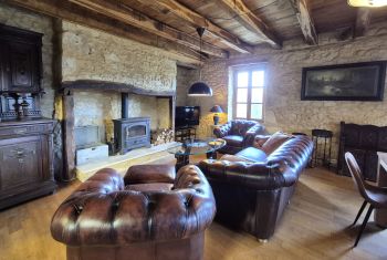 avec canapé et fauteuils en cuir