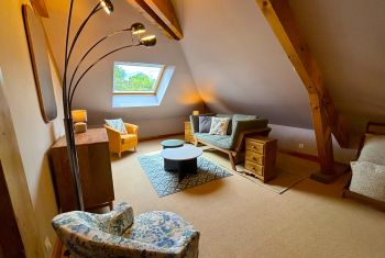 Le coin salon sur la mezzanine à l'étage 